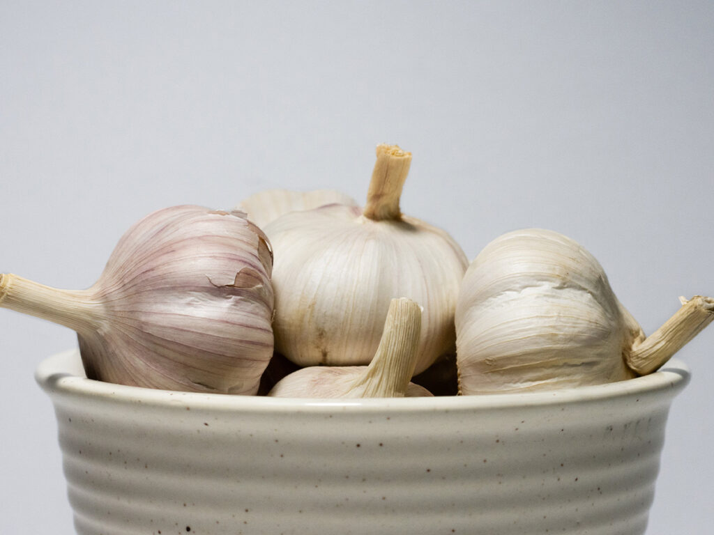 Bowl of garlic bulbs