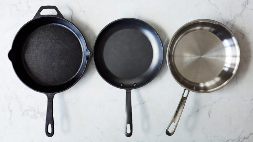 Which kind of pan is best for searing steak, cast iron, steel, or clad