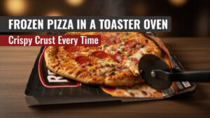 Frozen pizza on its cardboard tray with a pizza cutter, golden crispy crust, cooked in a toaster oven